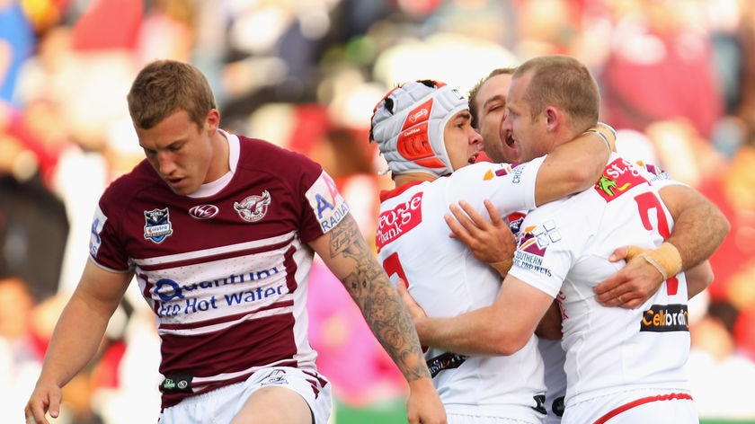 Jamie Soward and Jason Nightingale congratulate Ben Hornby on his try