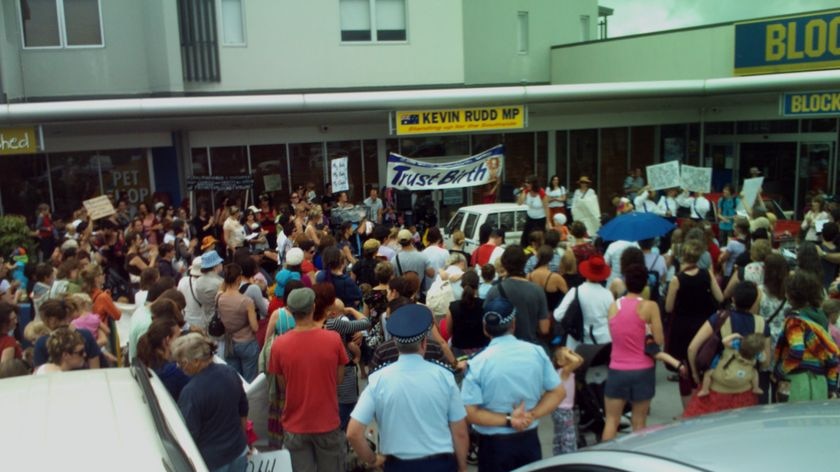 Protesters gather outside PM Kevin Rudd's electorate office in Brisbane