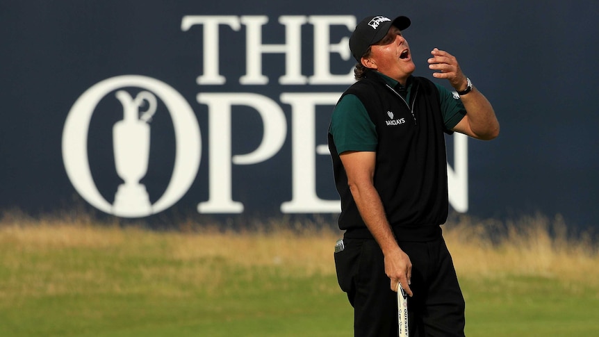 American Phil Mickelson reacts after his birdie putt misses on 18 in the 2016 Open first round.
