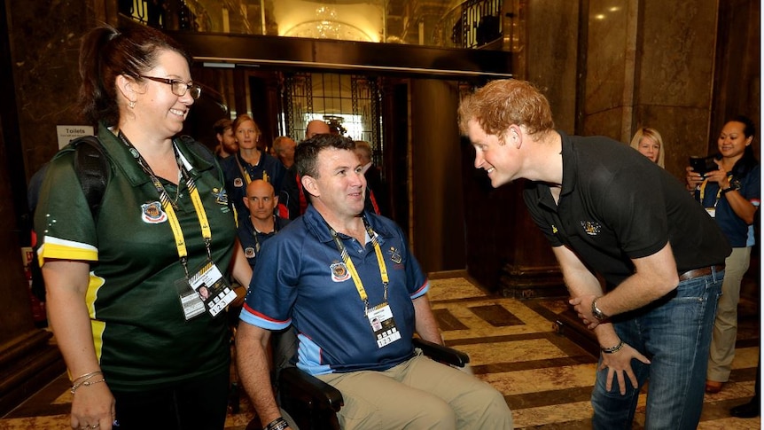 Garry Robinson with Prince Harry.
