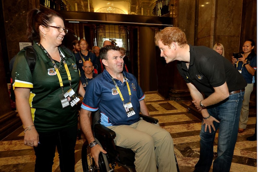 Garry Robinson with Prince Harry.