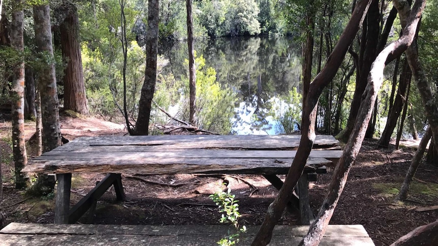 Wooden picnic bench at Duckhole Lake, in southern Tasmania.