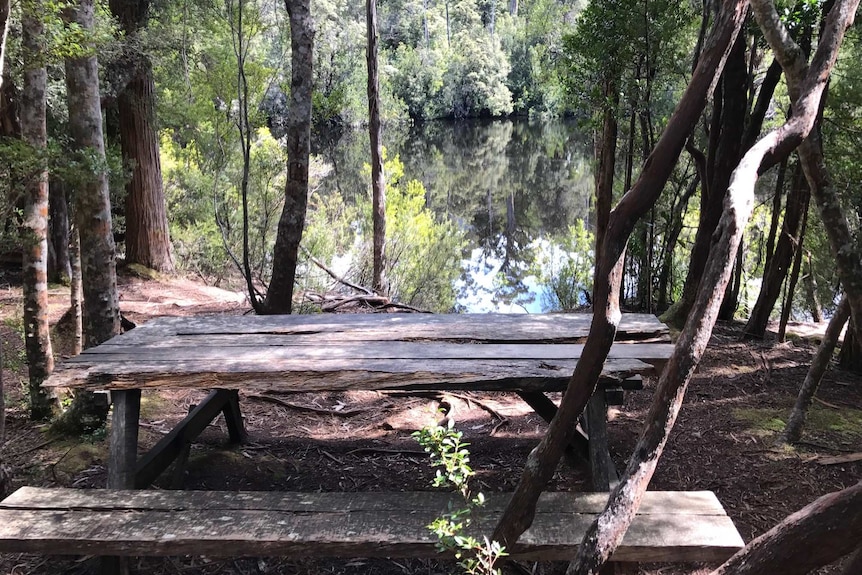 Wooden picnic bench at Duckhole Lake, in southern Tasmania.