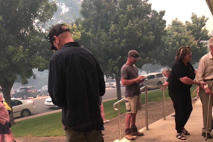 Lucindale residents standing in front of a building in town