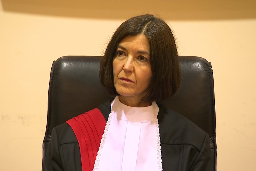 A judge in a courtroom.