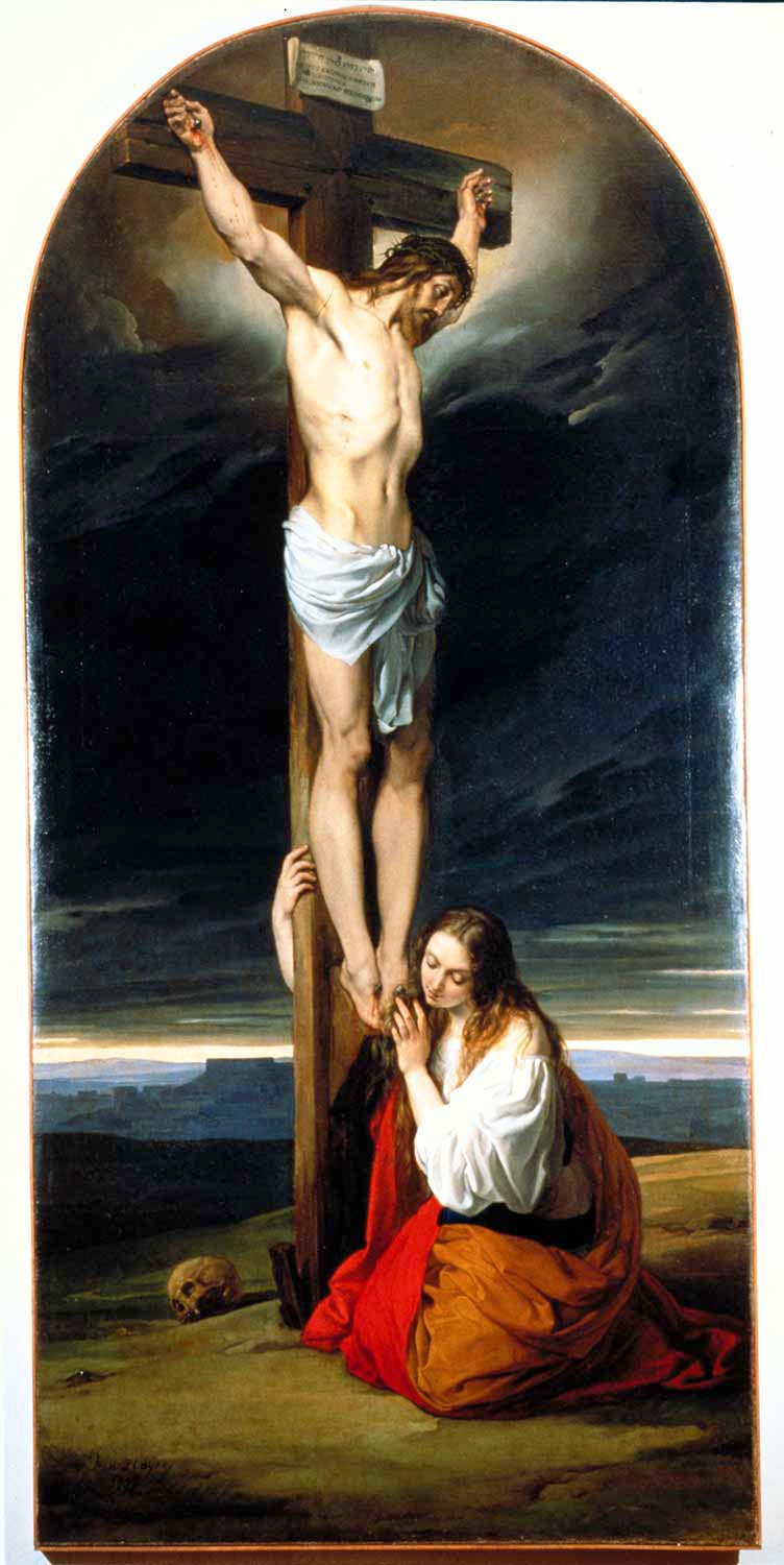 An old-fashioned painting of Christ being crucified with a women at his feet.