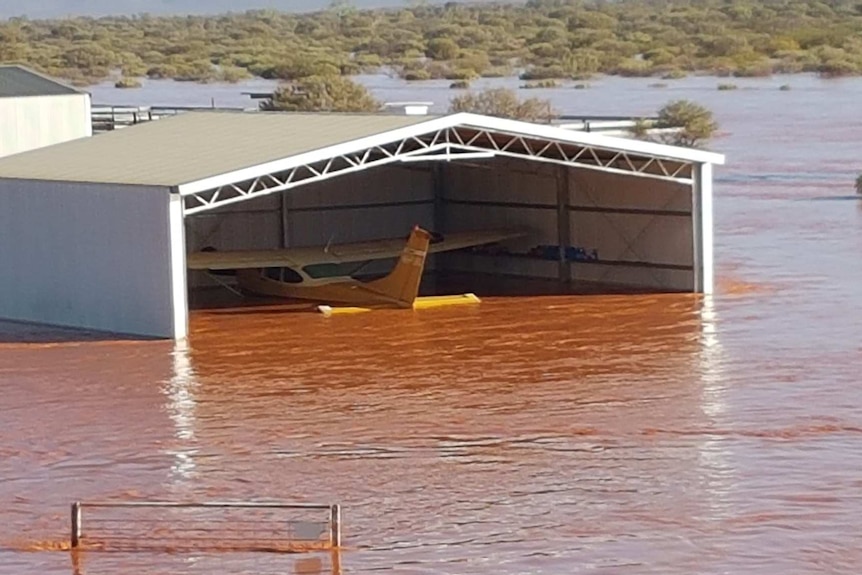 Plane in flooded hangar