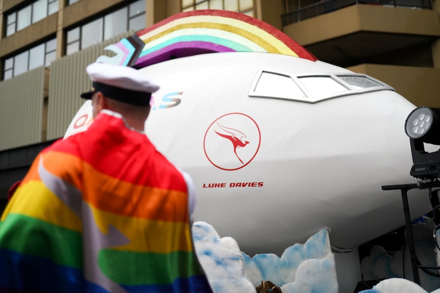 A Qantas mardi gras float with Luke Davies written on it