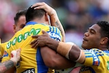 Parramatta Eels celebrate a try against the Newcastle Knights