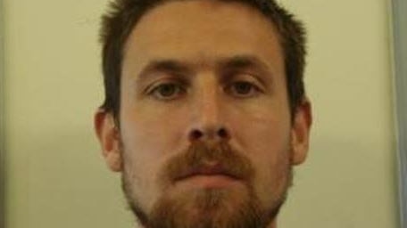 A headshot of prisoner Kyle Rowett