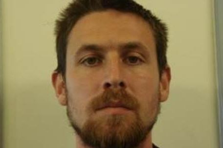 A headshot of prisoner Kyle Rowett