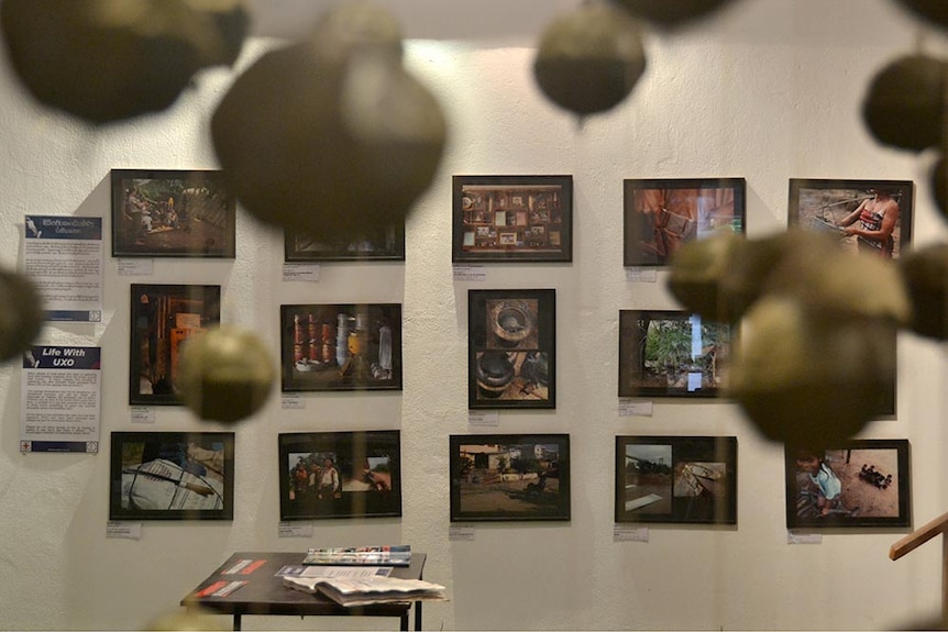 Photographs of the Vietnam War lining the walls of the COPE visitors centre