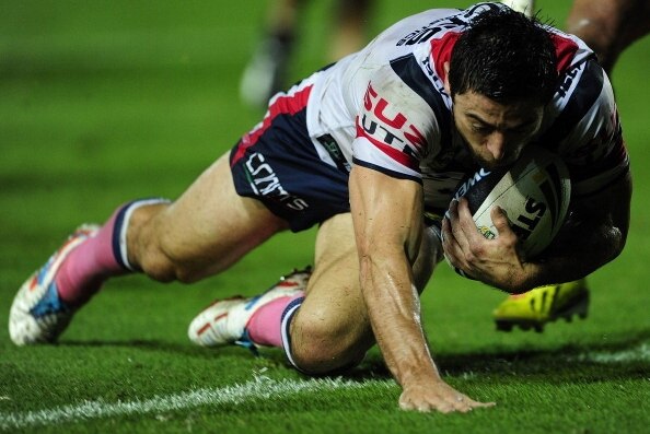 Anthony Minichiello crosses the line for the Roosters against Cowboys