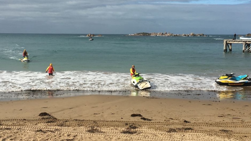 Surf lifesavers on jet skis in the ocean at Port Elliot