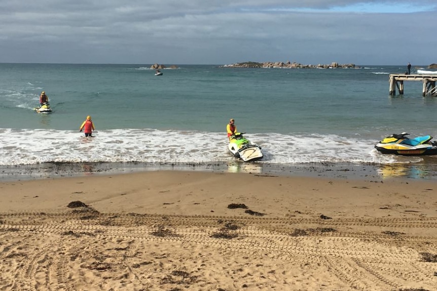 Surf lifesavers on jet skis in the ocean at Port Elliot