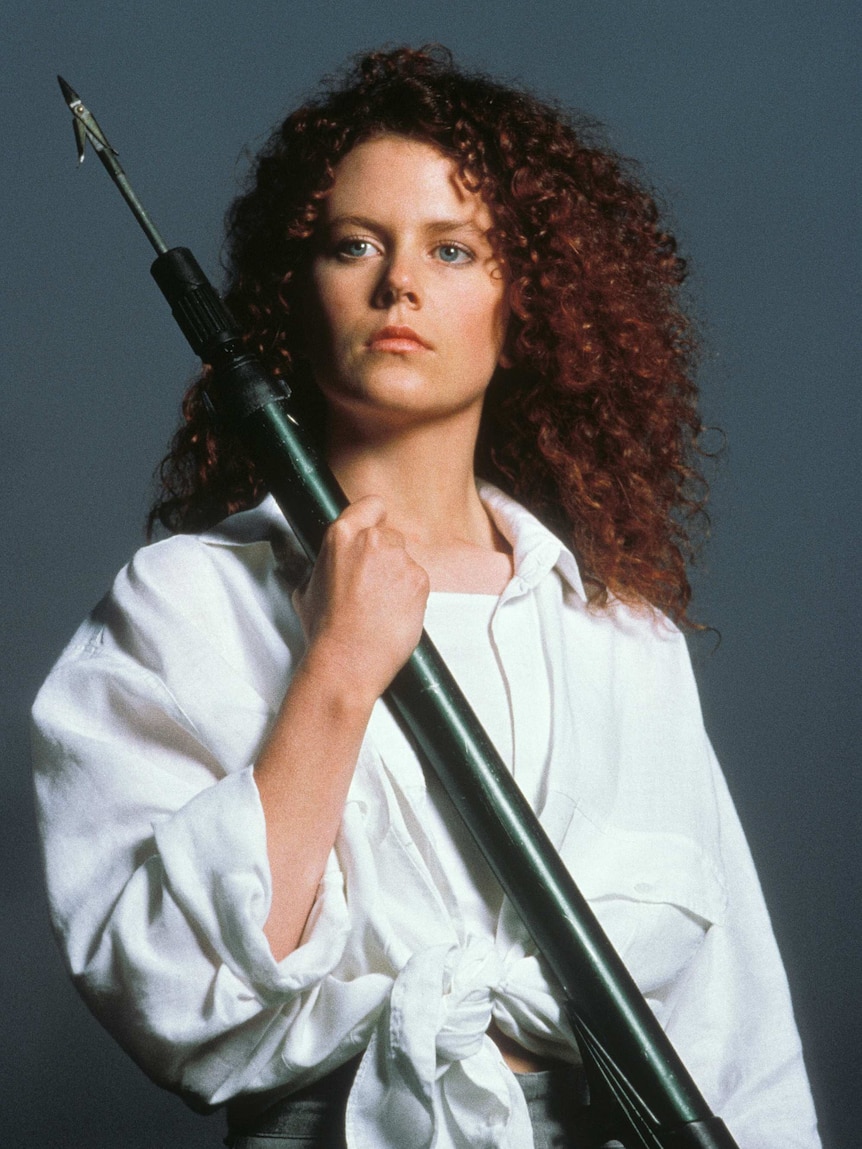Dead Calm - Nicole Kidman as Rae Ingram holding a spear gun by Jim Sheldon