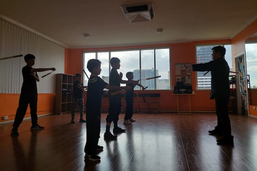 Martial artist Ye Bingchen leads a Kung Fu class in Adelaide.