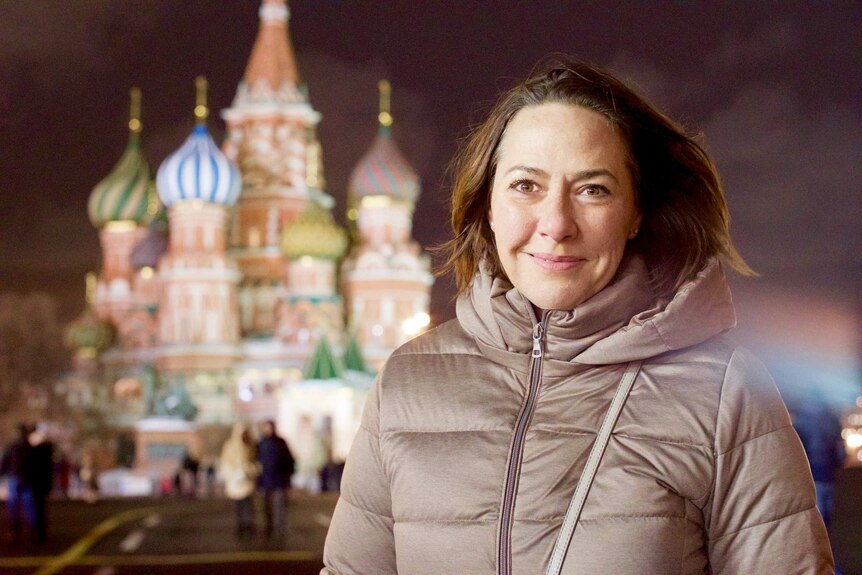 Lisa standing in Moscow.