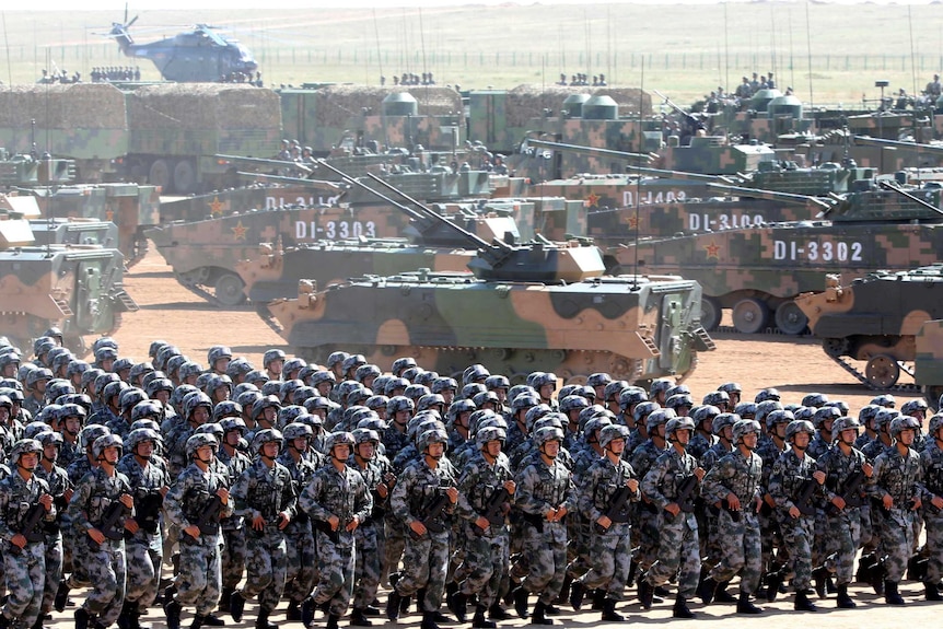 Soldiers of China's People's Liberation Army (PLA) take part in a military parade.