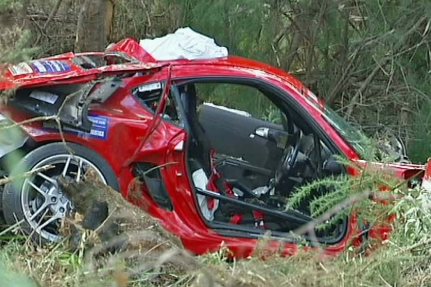 John Mansell's Porsche was doing more than 200 kilometres an hour when it crashed into a tree.