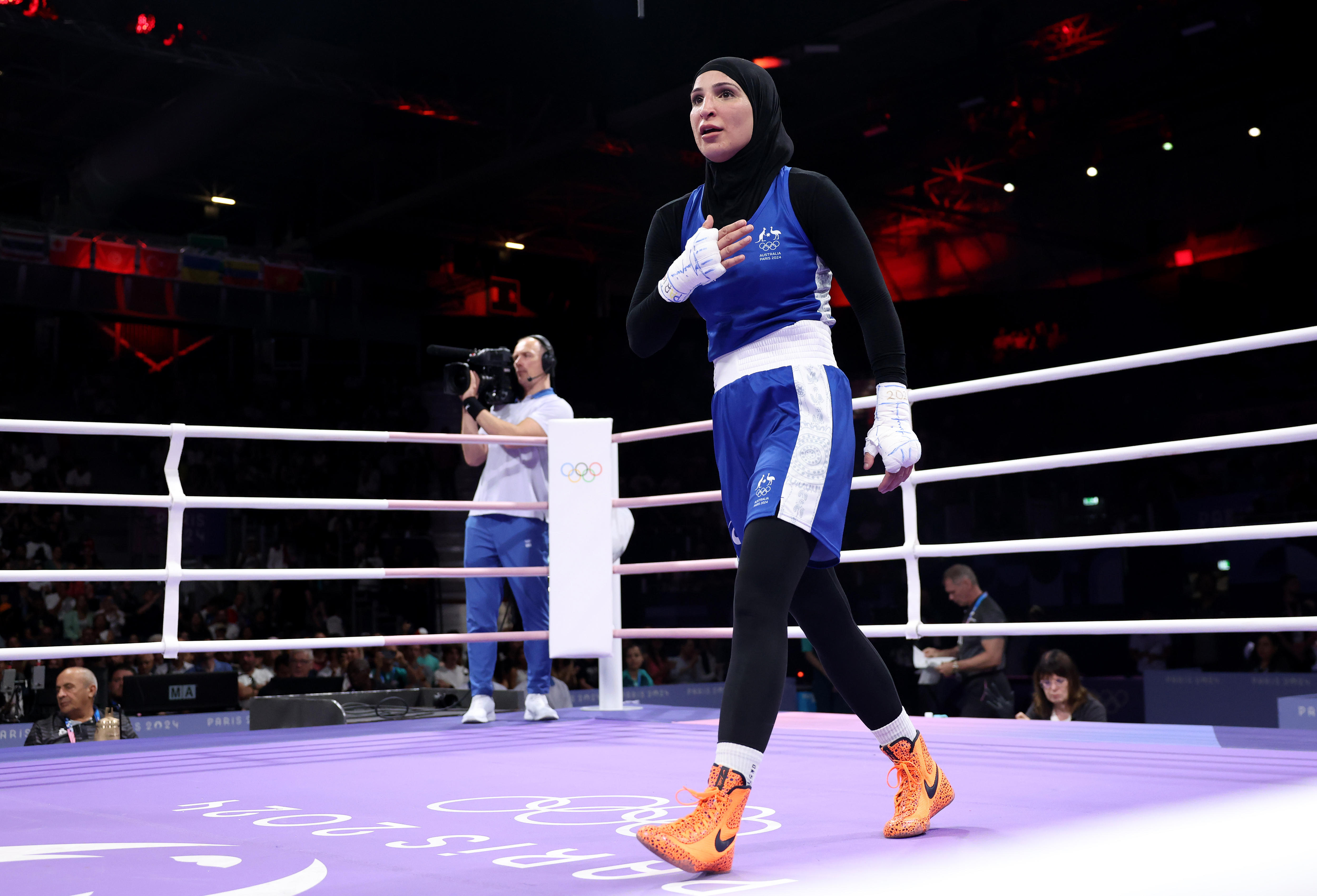 Tina Rahimi of Team Australia reacts to her defeat at the Olympics