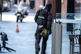 Police officer near site of siege in Sydney's Martin Place