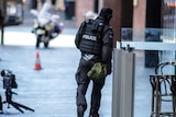 Police officer near site of siege in Sydney's Martin Place