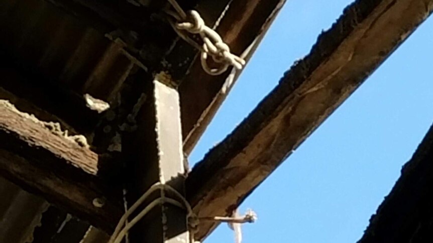 A picture of wooden beams with rope around them. The AWU says it was taken inside Hobart's Nyrstar smelter.