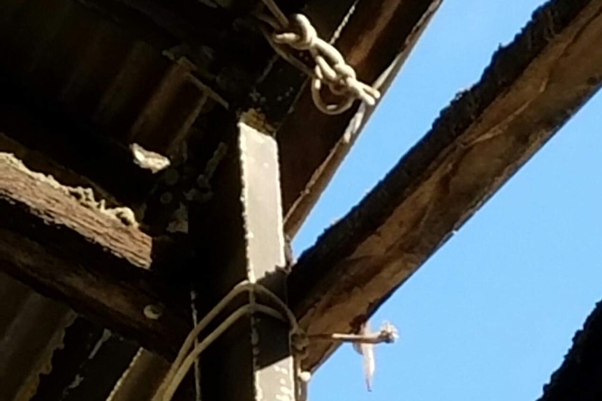 A picture of wooden beams with rope around them. The AWU says it was taken inside Hobart's Nyrstar smelter.