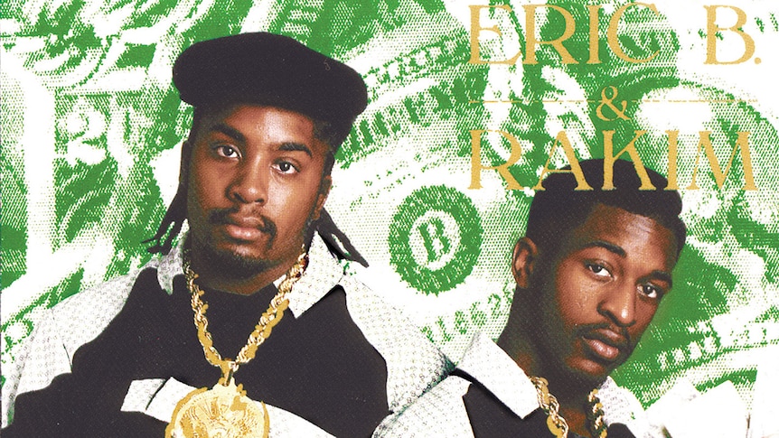 Eric B and Rakim wear large gold chains before a background of American currency