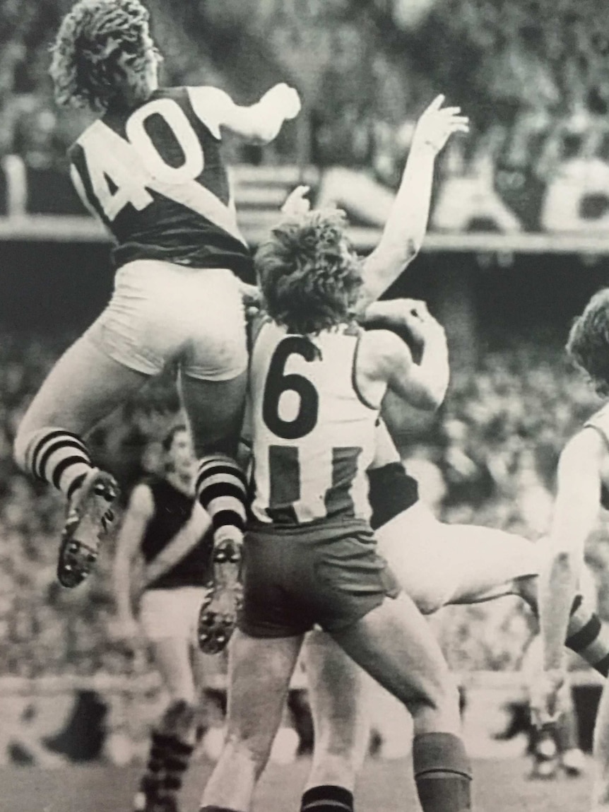Two men jump to mark the ball in the VFL.