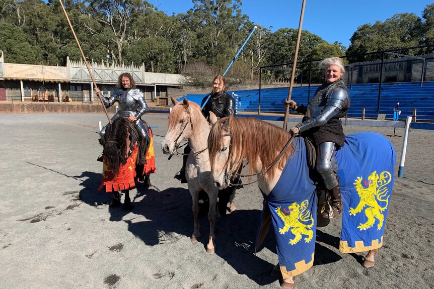 A group of knights seated on horseback at Kryal Castle near Ballarat in Victoria, May 2020.
