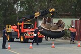Rafts from the Thunder River Rapids ride being moved into the Dreamworld car park