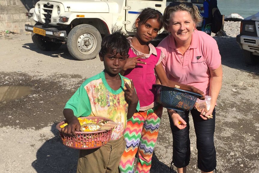 Dr Sally Williams with children in India.
