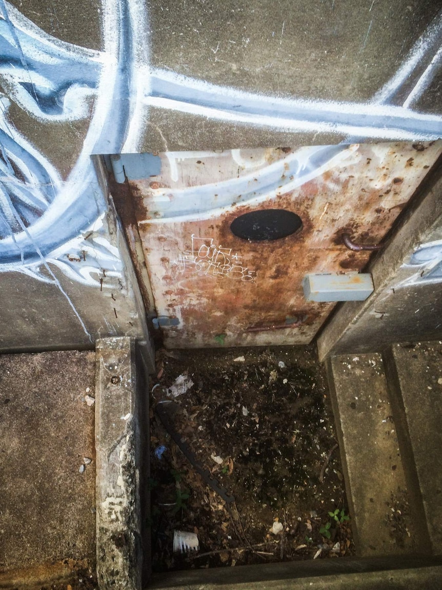 Old rusty bunker doors by the boardwalk.