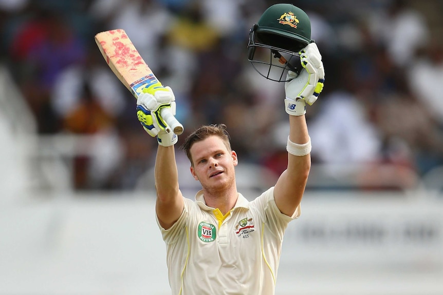 Australia's Steve Smith celebrates after reaching his Test century against West Indies in Jamaica.