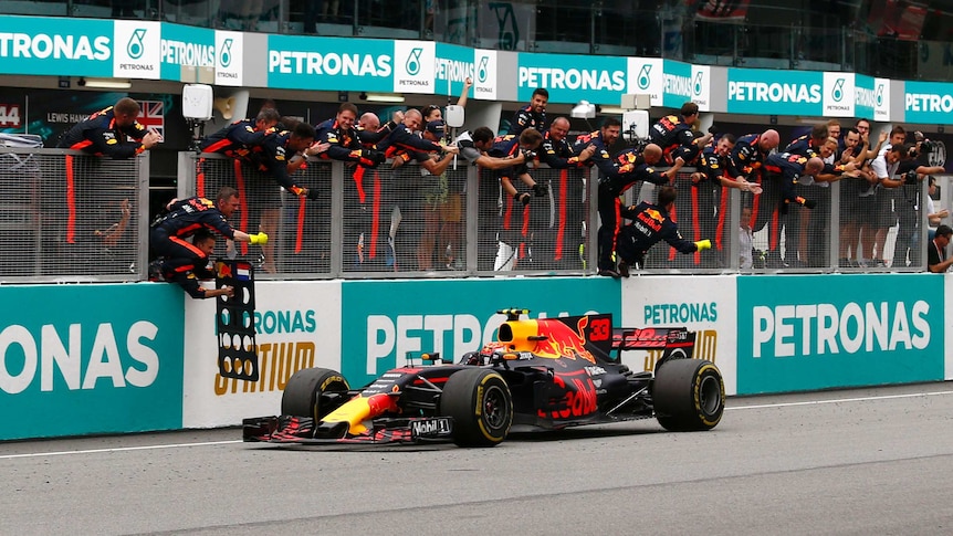 Max Verstappen celebrates Malaysia GP win