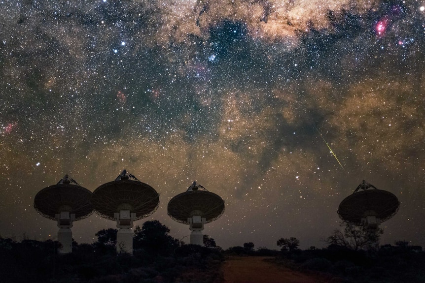 The Australian Square Kilometre Array Pathfinder with a star-filled sky in the background.