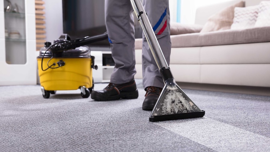 Vacuuming the floor