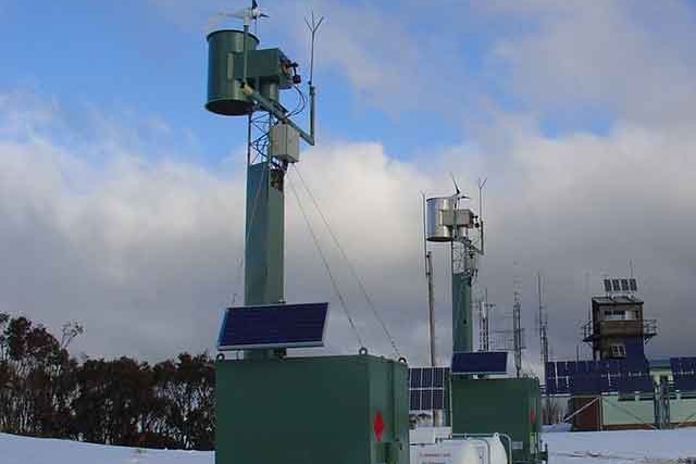 Box with solar panel and wind gauge with a burning chamber on top