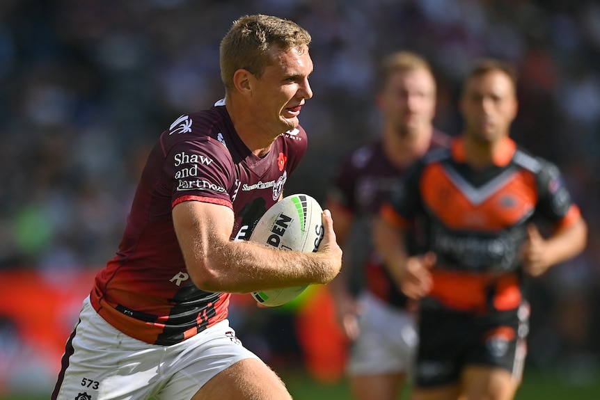 Tom Trbojevic runs the ball for Manly