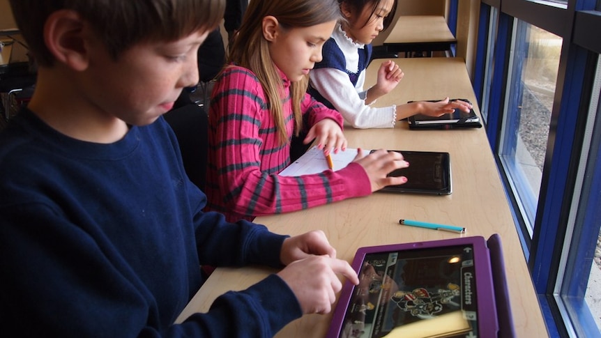 Children using iPads.