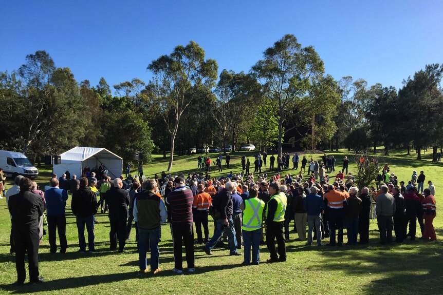 Hundreds gather on the site of Newcastle's former BHP steelworks in Mayfield to mark the 100 year anniversary of its opening.