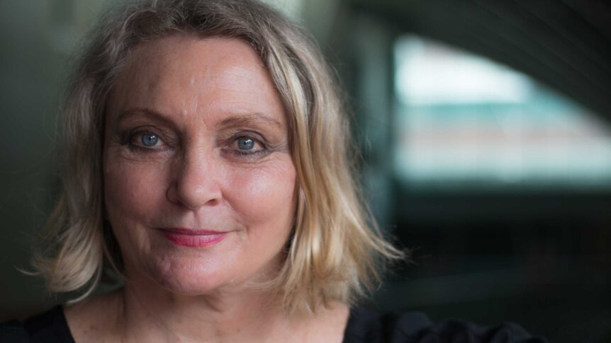 Tracks author Robyn Davidson smiles for a photo.