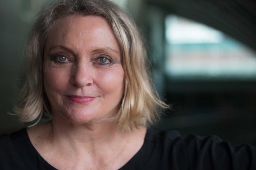 Tracks author Robyn Davidson smiles for a photo.