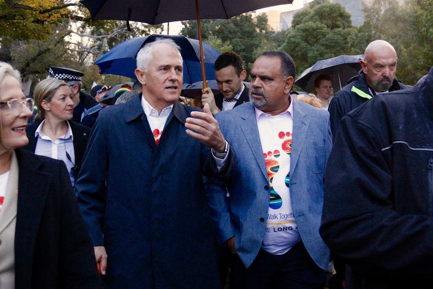 Malcolm Turnbull talks with Michael Long while on the Long Walk.