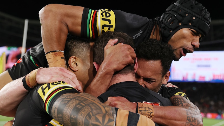 Penrith Panthers players celebrate a grand final try
