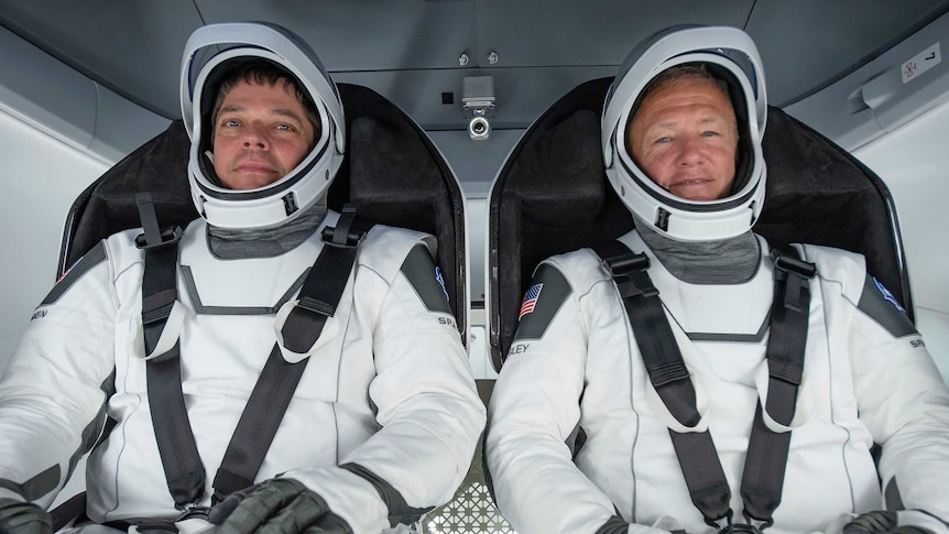Bob Behnken and Doug Hurley inside SpaceX's Dragon capsule.