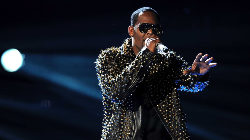 R Kelly performs on stage