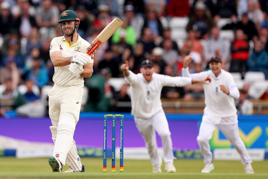 Australia batter Mitch Marsh looks nervous as England fielders celebrate behind him in an Ashes Test at Headingley.